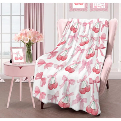 Pink cherry bow throw blanket